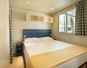 Postel nebo postele na pokoji v ubytování Camping Classe Village + 37 fotografií