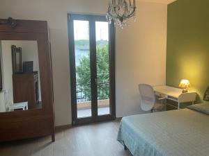 Casa Drema - Villa al mare con terrazza客房内的一张或多张床位
