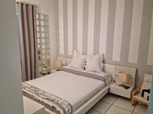 Postel nebo postele na pokoji v ubytování La Cameretta