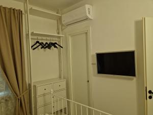 TV a/nebo společenská místnost v ubytování La Cameretta