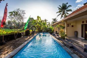 Bazén v ubytování Asri Sari Villa Ubud nebo v jeho okolí