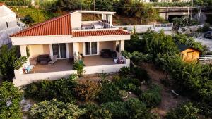 Zahrada ubytování Michelino House + 37 fotografií