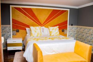 Un ou plusieurs lits dans un hébergement de l'établissement Xilumani Hotel