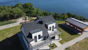 an overhead view of a house with a bench at Wyspówka in Międzyzdroje