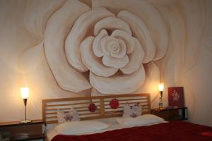 Postel nebo postele na pokoji v ubytování Hotel am Fluss