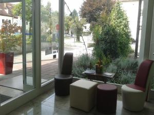Posezení v ubytování Hotel am Fluss