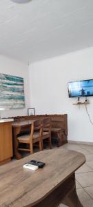 TV a/nebo společenská místnost v ubytování Apartmani Ivka