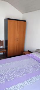 Postel nebo postele na pokoji v ubytování Apartmani Ivka