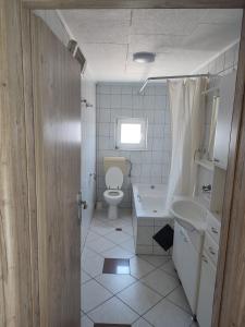 Kúpeľňa v ubytovaní Apartmani Ivka