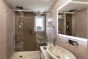 Koupelna v ubytování Hotel Li Finistreddi