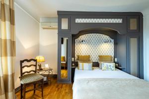 Кровать или кровати в номере Hostellerie Bourguignonne