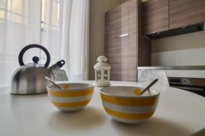 Cuina o zona de cuina de Contempora Apartments - Crocetta - Don Giovanni