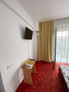 Μια τηλεόραση ή/και κέντρο ψυχαγωγίας στο Vila Gymy