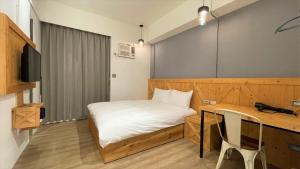 Postel nebo postele na pokoji v ubytování Sky Tree B&B