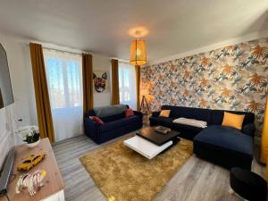 Posedenie v ubytovaní Homefleur - Maison 130m2 - 8 à 10 pers - Jardin