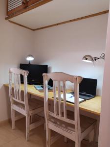 Telewizja i/lub zestaw kina domowego w obiekcie Casa Natal. Tú rincón acogedor en El Cotillo.