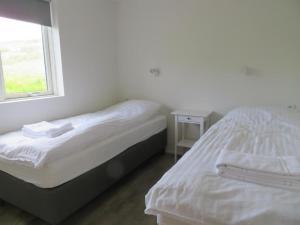 Mosas cottages客房内的一张或多张床位