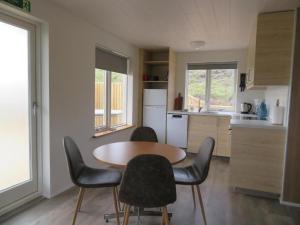 Kuchyň nebo kuchyňský kout v ubytování Mosas cottages + 23 fotografií