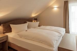 Katil atau katil-katil dalam bilik di Elbresort Kurort Rathen