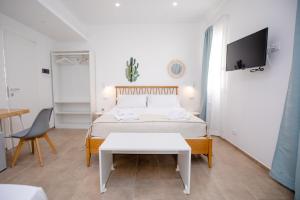 Posteľ alebo postele v izbe v ubytovaní Kaary BellaVita Superior Room