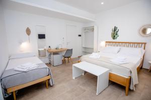 Posteľ alebo postele v izbe v ubytovaní Kaary BellaVita Superior Room