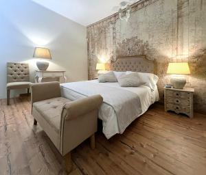 Posteľ alebo postele v izbe v ubytovaní B&B Donna Cinzia