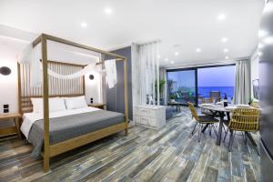 Posteľ alebo postele v izbe v ubytovaní Villa Dorra Coast Suites + 19 fotografií