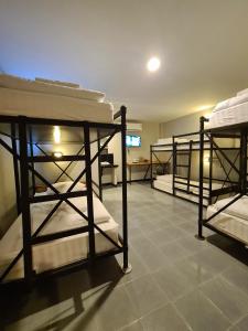 Postel nebo postele na pokoji v ubytování The 8 Factory Hotel Phitsanulok