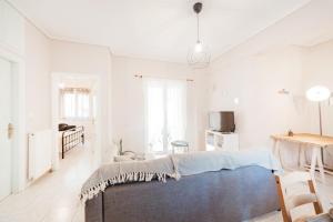 Ένα ή περισσότερα κρεβάτια σε δωμάτιο στο Rose’s House