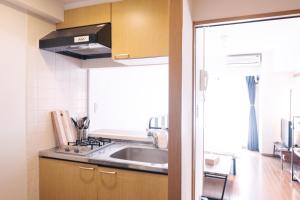 Kjøkken eller kjøkkenkrok på MINIMAL SHIMOKITA Stylish Loft or Studio Apt