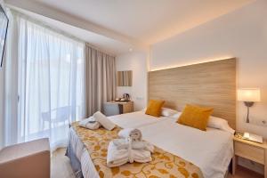 Posteľ alebo postele v izbe v ubytovaní Hotel Ilusion Moreyo - Adults Only