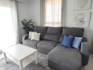 Posezení v ubytování DUPLEX C9 con PISCINA PRIVADA