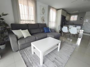 Posezení v ubytování DUPLEX C9 con PISCINA PRIVADA