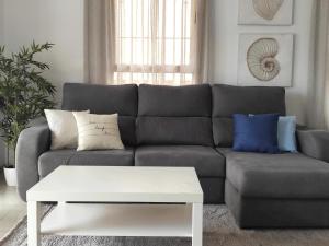 Posezení v ubytování DUPLEX C9 con PISCINA PRIVADA