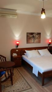 Postel nebo postele na pokoji v ubytování Drini Hotel