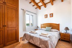 Postel nebo postele na pokoji v ubytování Villa Santi II by Villa Plus + 12 fotografií
