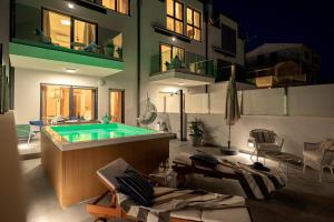 a pool in the middle of a building at NEW! ReLux Hvar - Remote Luxury Homes in Hvar