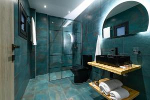 Kúpeľňa v ubytovaní Villa Dorra Coast Suites