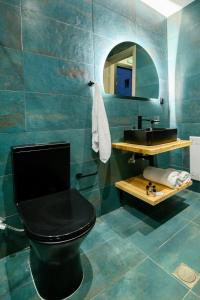 Kúpeľňa v ubytovaní Villa Dorra Coast Suites