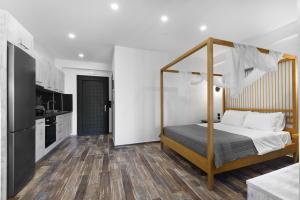 Posteľ alebo postele v izbe v ubytovaní Villa Dorra Coast Suites