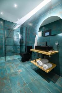 Kúpeľňa v ubytovaní Villa Dorra Coast Suites