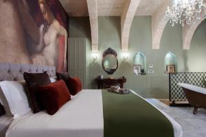 Postel nebo postele na pokoji v ubytování The Coleridge Boutique Hotel In Valletta
