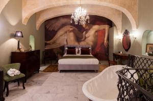 Postel nebo postele na pokoji v ubytování The Coleridge Boutique Hotel In Valletta
