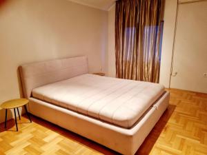 Postel nebo postele na pokoji v ubytování Apartman Branko