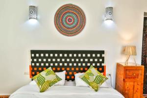 Postel nebo postele na pokoji v ubytování Luxury Riad Mounia