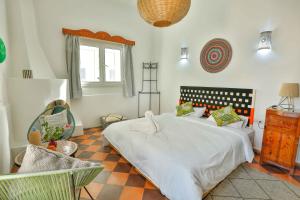 Postel nebo postele na pokoji v ubytování Luxury Riad Mounia + 37 fotografií