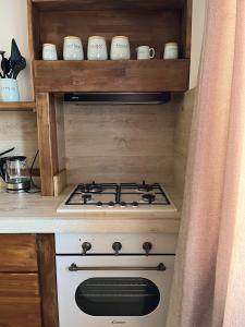 Kuchyň nebo kuchyňský kout v ubytování Romantic apartments