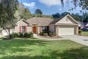 a house with a driveway and a garage at Pooler Travelers Retreat VI - Entire House - in Savannah