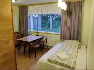 Postel nebo postele na pokoji v ubytování Bakland ad Lágafelli Apartment