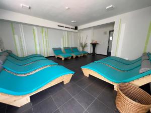 Ένα ή περισσότερα κρεβάτια σε δωμάτιο στο eFi Palace Hotel